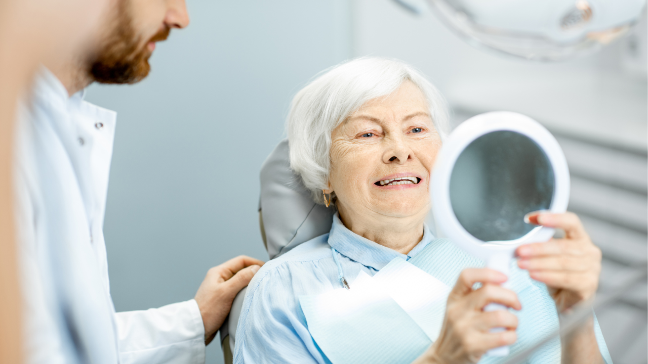 Dental Implants vs Dentures - Weighing Your Tooth 